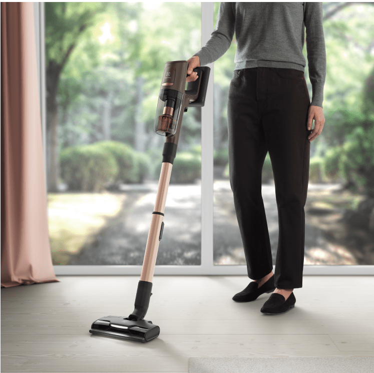 Person holding vacuum