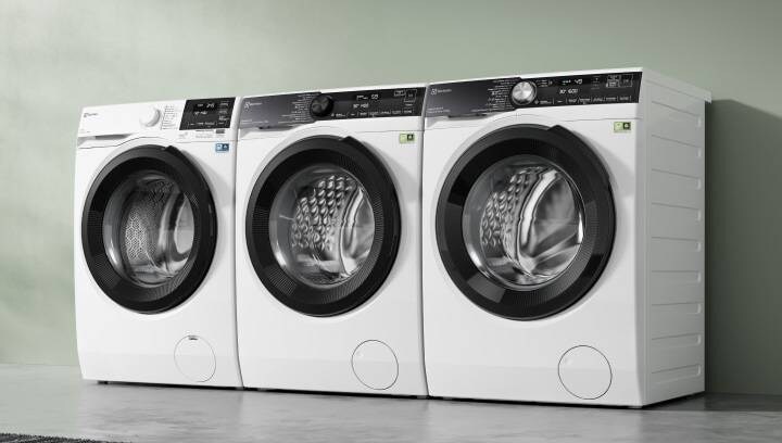 Three different Electrolux washing machines placed next to each other